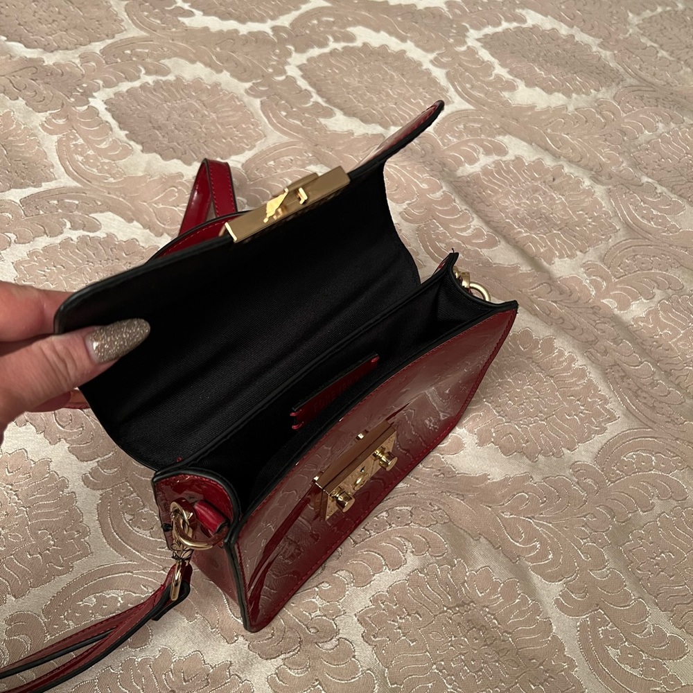 I am selling it because I have too many bags